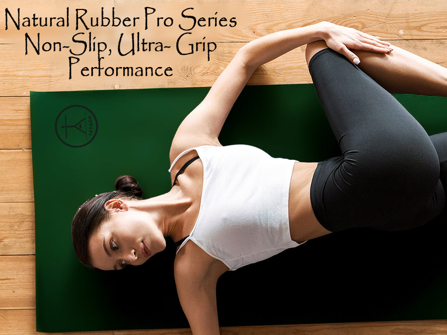 Woman stretching on green non-slip yoga mat for home yoga and Pilates.