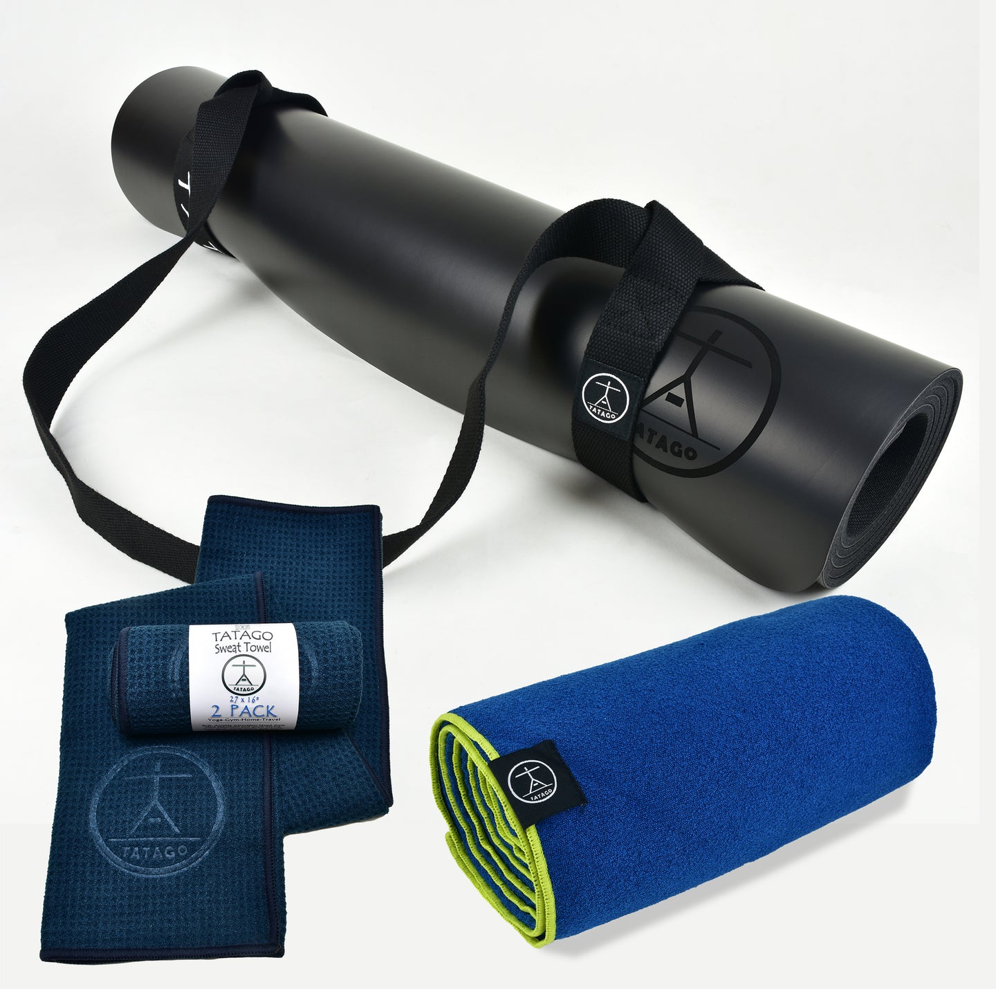 Black extra-large yoga mat with carrying strap shown with a blue hot-yoga towel and navy sweat towels set; ideal for hot yoga, Pilates, and Bikram sessions.