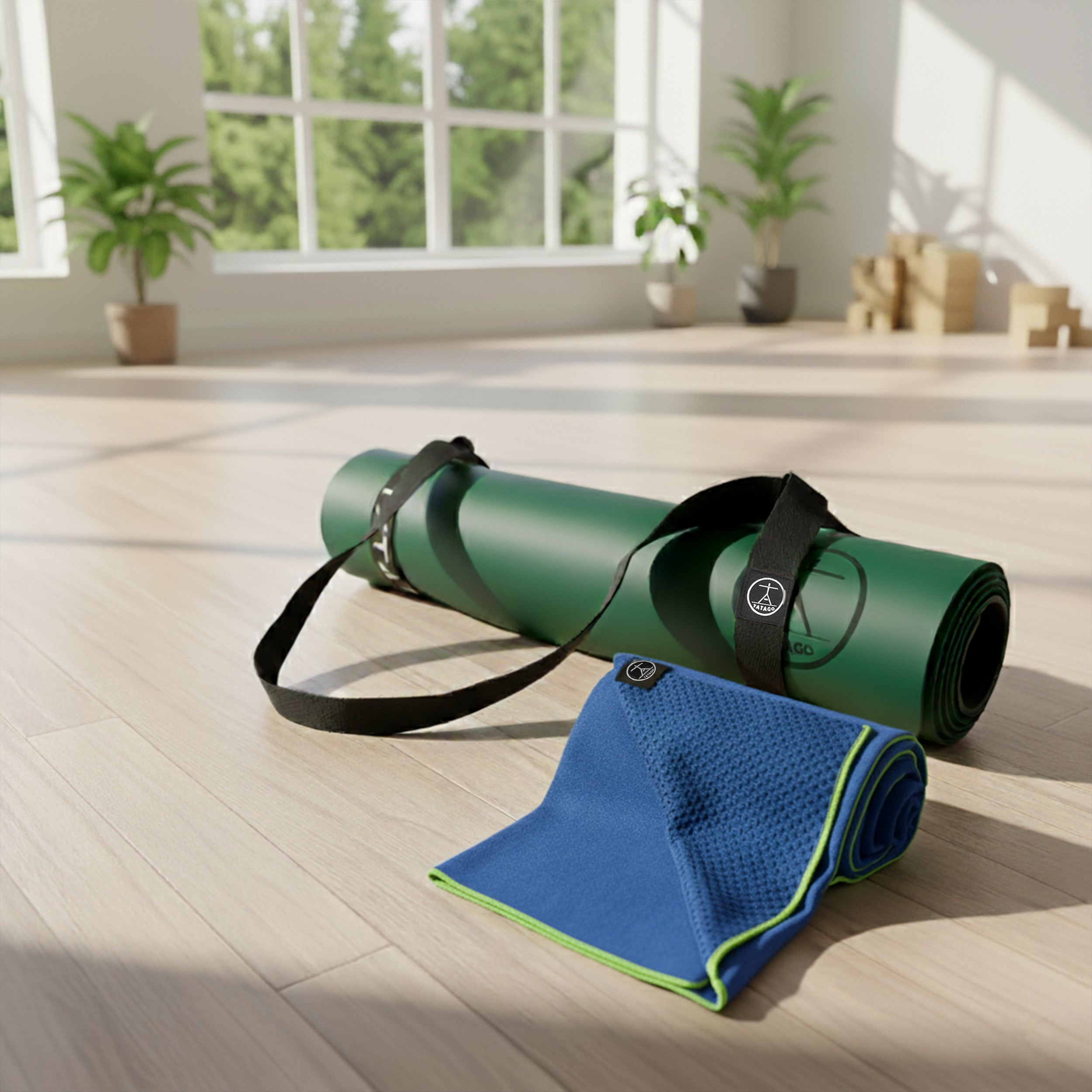 Extra-large yoga mat with towel and strap indoors