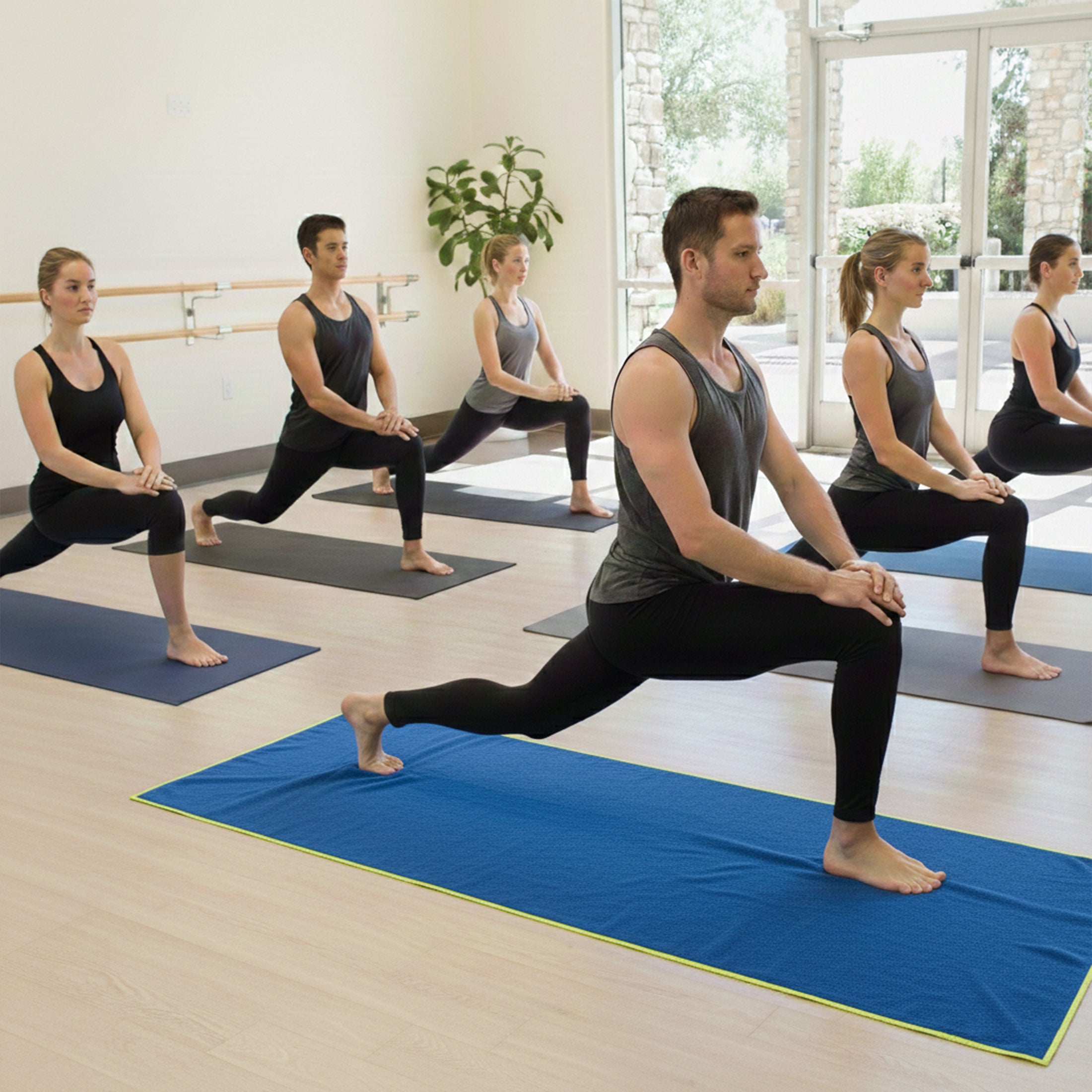 XL yoga with towel during hot yoga practice on a yoga mat - Cobalt Blue